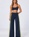 Wide leg contrast stripe pants in navy with yellow stripes, view 1