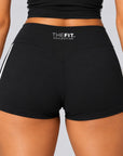 Back of black sculpt shorts with V-shaped seam and THE FIT. COLLECTION logo