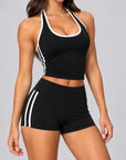 Black contrast stripe sculpt shorts styled with matching halter singlet