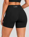 Black sculpt bike shorts, back close-up showing V-seam and THE FIT. COLLECTION logo