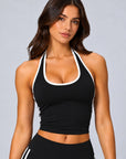Contrast halter singlet in black with white trim, front view