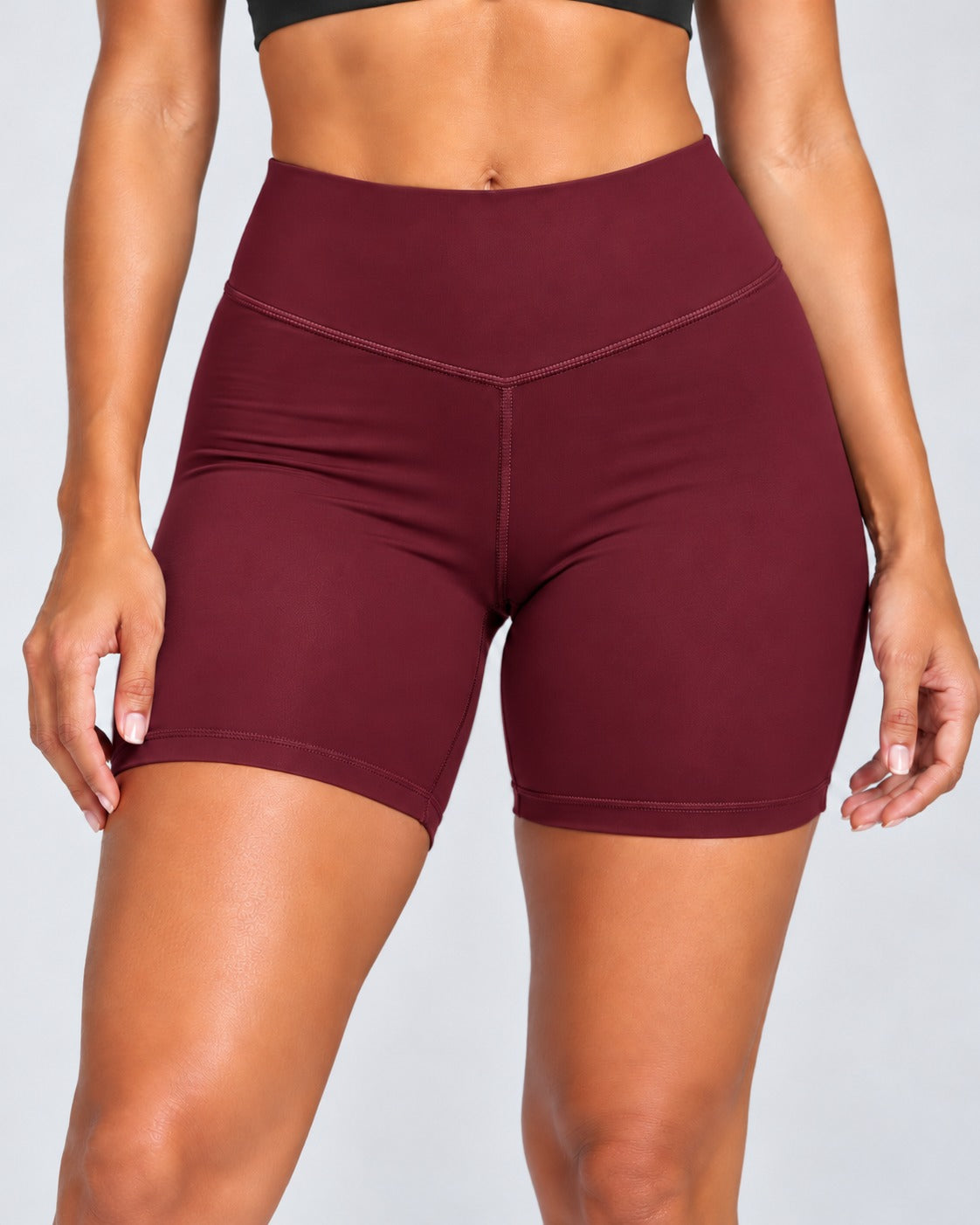 Burgundy sculpt bike shorts, close-up of high-rise V-front waistband