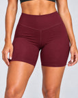 Burgundy sculpt bike shorts, close-up of high-rise V-front waistband