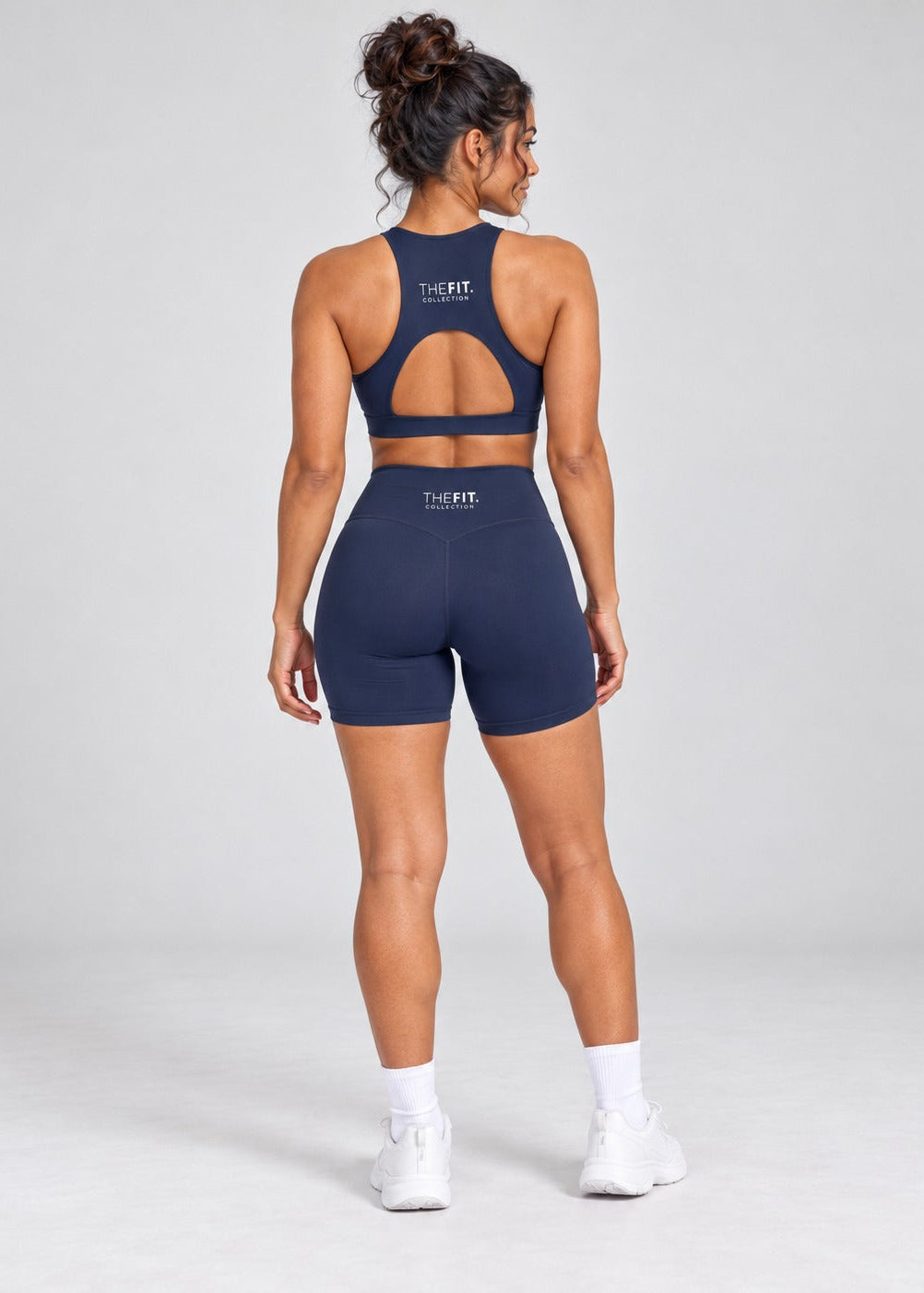 Navy sculpt bike shorts, full length back view