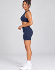 Navy sculpt bike shorts, full length side view